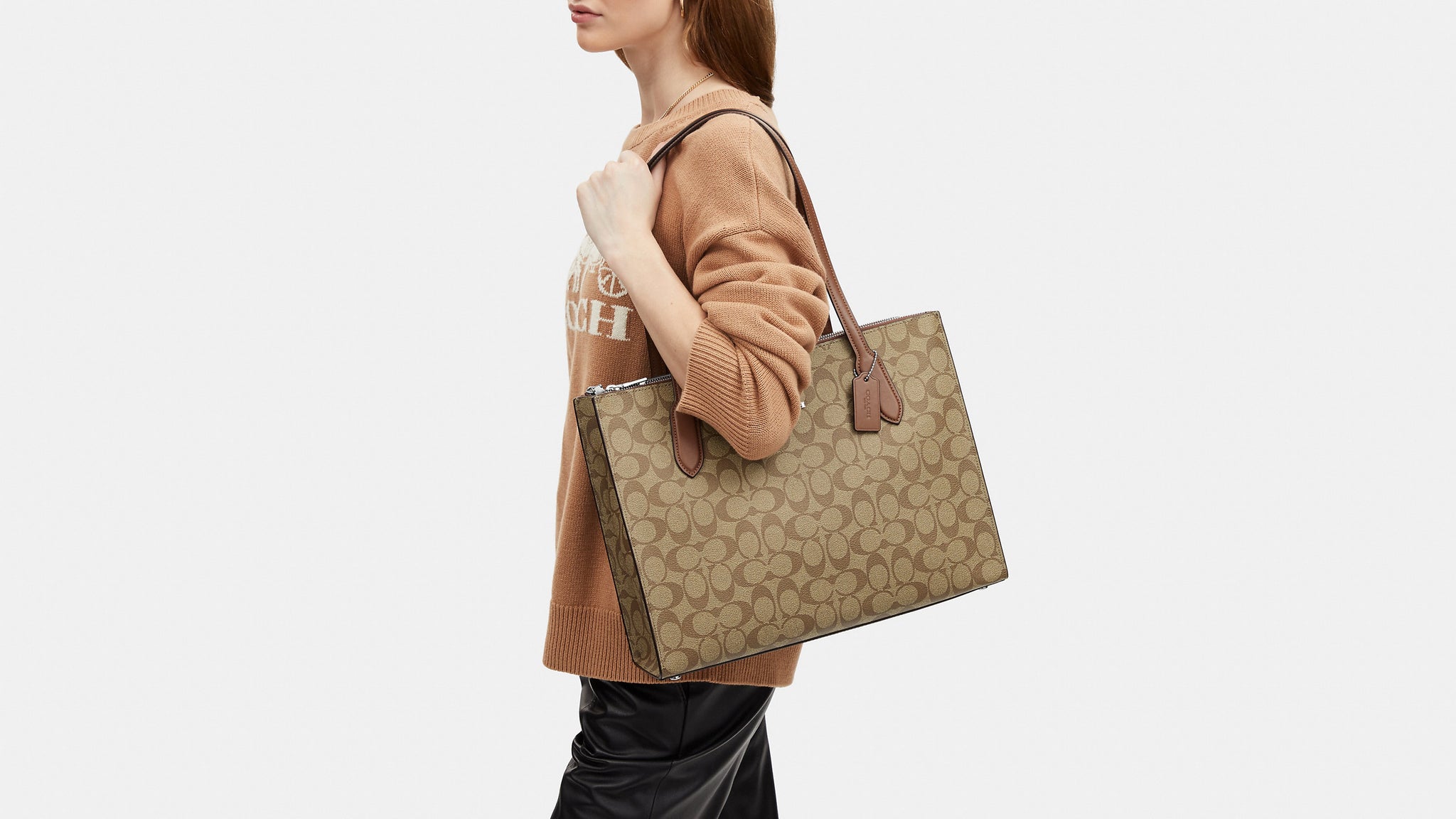 Coach- Nina Carryall In Signature Canvas