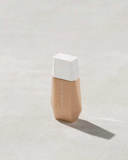 Fenty Beauty- EAZE DROP BLURRING SKIN TINT (10 medium with warm yellow undertone)